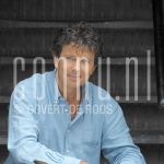 25-06-2004 Robert ten Brink in Amsterdam, on behalf of SBS Broadcasting. June 25, 2004.

[keywords]Posed, Half Length, Smiling, Stairs[/keywords]